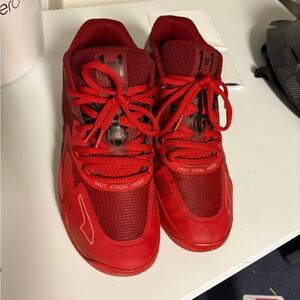 Puma Melo’s Bold Red Sneakers